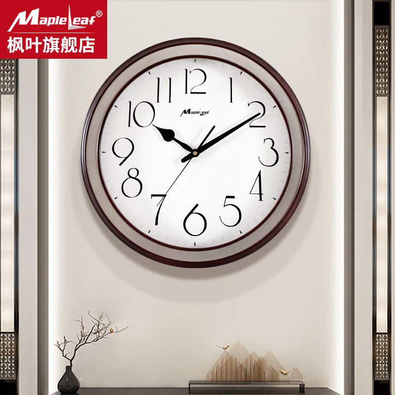 New Chinese modern muted solid wood metal hanging clock living room home creative personality clock minimalist light extravagant quartz clock