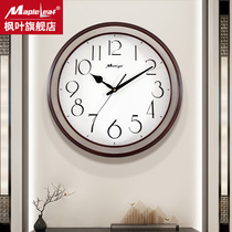 New Chinese modern muted solid wood metal hanging clock living room home creative personality clock minimalist light extravagant quartz clock