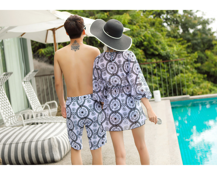 Cặp đôi phù hợp với áo tắm nữ bikini ba mảnh dài tay kỳ nghỉ hình ảnh váy váy áo nam năm điểm quần đi biển 	đồ đôi đi biển màu trắng	