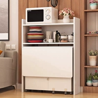 Обеденный стол длиной 1,2 м с боковым шкафчиком шириной 65 см белого цвета.