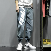 Hong Kong Chaobou Spring Fall Pumping Rope Washed jeans Mens Han version Splicing Letters Casual Bungling foot tooling pants