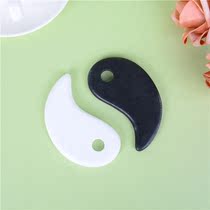 Natural black and white jade scraping plate of jade