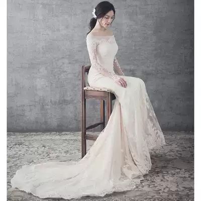 Light wedding dress female 2021 new bridal forest Super fairy dream one word shoulder fish tail long sleeve tailing tail go out yarn Spring Spring