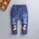 Trẻ em mặc quần trẻ em cho bé trai và bé gái quần dài mùa xuân và mùa thu quần denim bé trai xuân hè