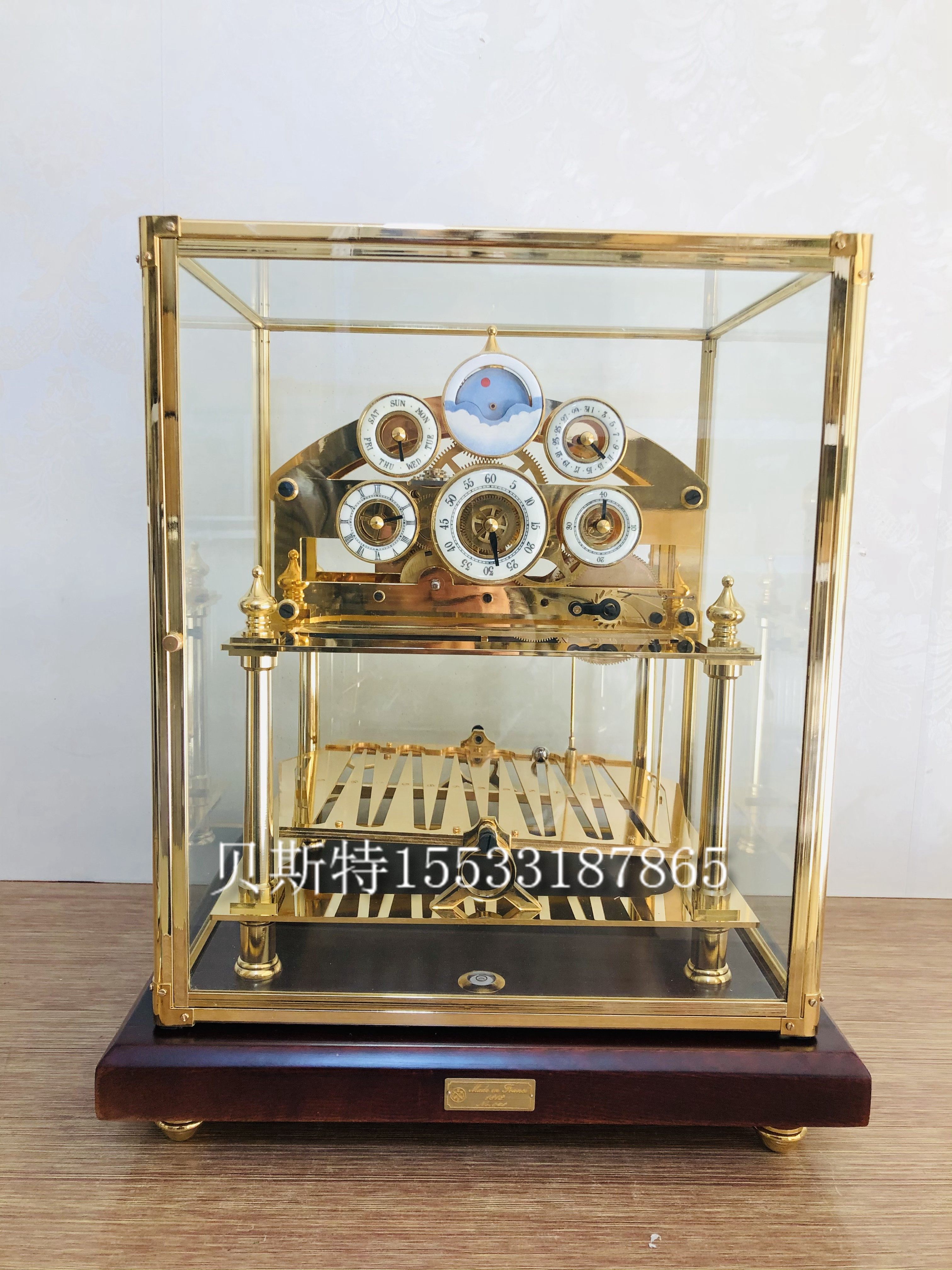 Ball clock gossamer pendulum star sun moon steel ball track dynamic fun table clock glass cover gold-plated mechanical clock light luxury