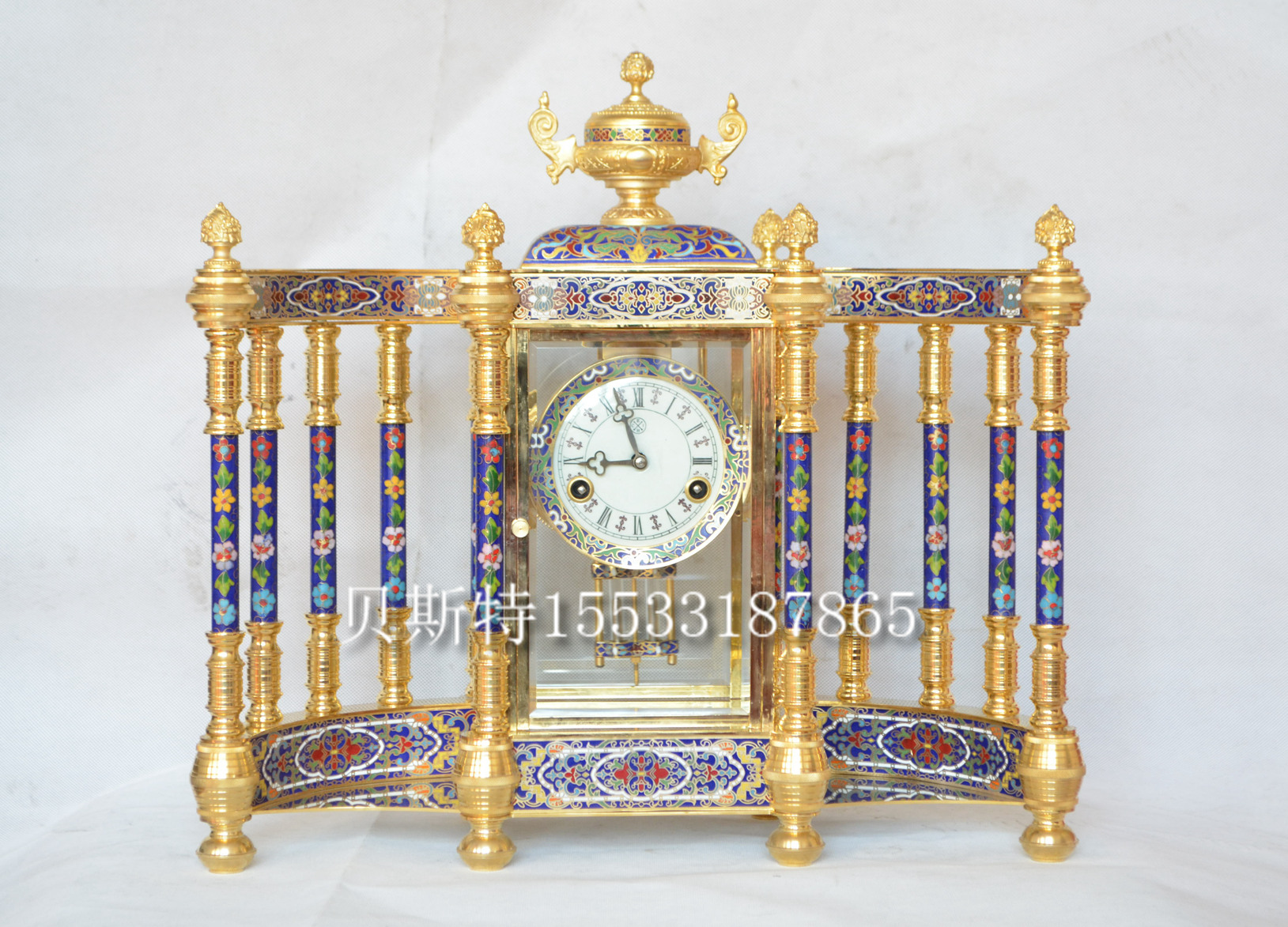 Cloisonne clock pure copper gold-plated cloisonné enamel table clock classical mechanical timekeeping table clock Gan Kun Ruyi sitting clock
