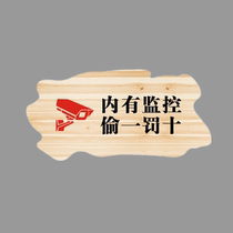 There is a monitoring stealing a penalty of ten acrylic signs. There is a monitoring to keep a smile.