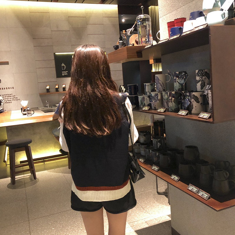 Phiên bản Hàn Quốc của áo gió cổ đại hoang dã không tay vest + áo sơ mi + áo sơ mi cổ lọ + áo len dệt kim chân rộng áo cardigan nữ