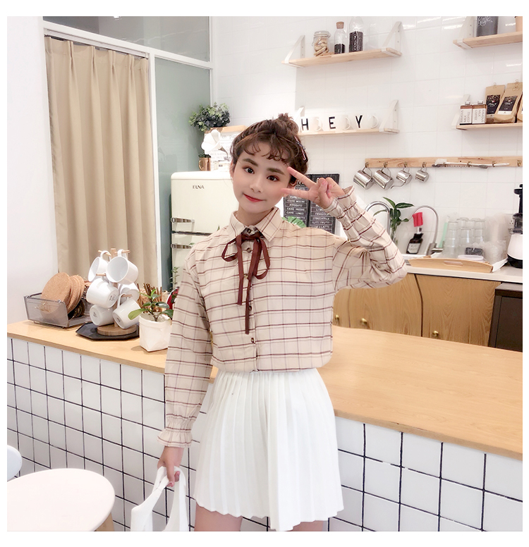 Mùa xuân của phụ nữ phiên bản Hàn Quốc của áo sơ mi kẻ sọc hoang dã lỏng lẻo thắt nơ dài tay áo sơ mi nữ kẻ ca rô dài tay