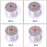 Прозрачные бусины, шелковые нитки, эластичная нейлоновая леска