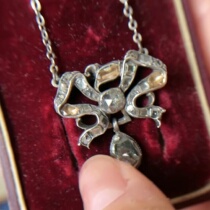 4 30 Georgian Bow Diamond Pendant