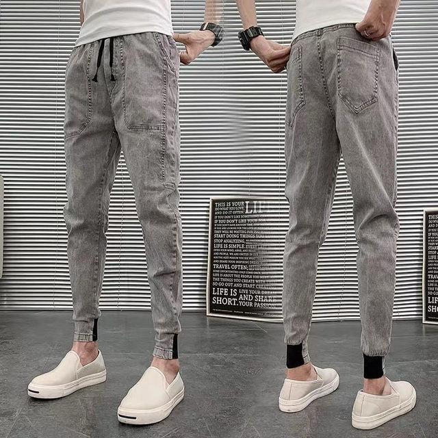 ດູໃບໄມ້ລົ່ນແລະລະດູຫນາວຂອງຜູ້ຊາຍ jeans ຕີນຂະຫນາດນ້ອຍໃຫມ່ສີແຂງ trendy ເກົ້າຈຸດ pants harem pants ອິນເຕີເນັດສະເຫຼີມສະຫຼອງ trendy pants ບາດເຈັບແລະຜູ້ຊາຍ