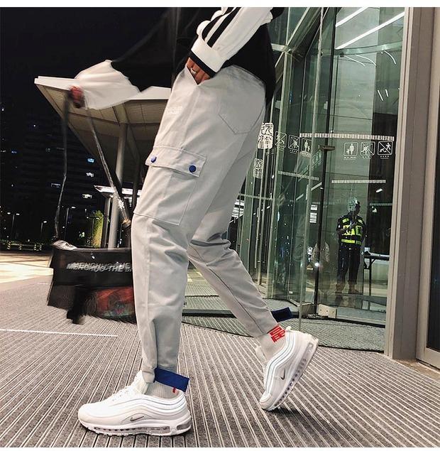 Multi-Pocket ins super fire overalls nam thương hiệu chic chic lỏng lẻo phiên bản Hàn Quốc của xu hướng quần chín điểm giản dị quần jogger nam