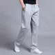 Mùa xuân và mùa thu quần thể thao quần tây nam thường lỏng lẻo thẳng đan quần cộng với phân bón XL chạy quần