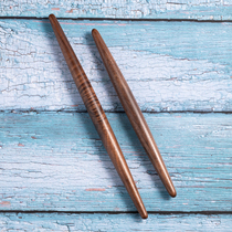 Grandmas rolling pin is made of solid wood with two pointed ends imported black walnut small size household solid wood dumpling skin