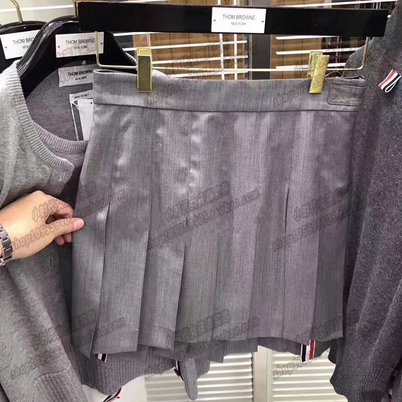 (Small Times France) thom browne spring and summer tb classic front short back long skirt A-line pleated skirt