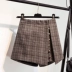 2018 thu đông mới retro không chân rộng kẻ sọc quần short giả váy hai dây quần len cạp cao quần váy nữ