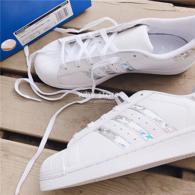 ADIDAS Cỏ ba lá siêu nhân Gương đầy màu sắc Laser Shell Đầu người phụ nữ Giày trẻ em lớn F33889 - Dép / giày thường giày thể thao đế cao