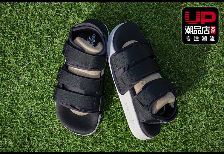 Adidas Adidas cỏ ba lá mùa hè mới velcro nam giới và phụ nữ thể thao bãi biển dép AC8583 màu đen và trắng dép quai hậu nam gucci