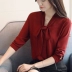 Mùa xuân 2019 áo sơ mi trắng nữ mới phiên bản Hàn Quốc của áo thun dáng dài tay voan rộng cổ áo sơ mi cổ chữ V Áo sơ mi