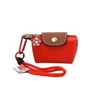 Mini dumpling bag niche design 2025 new style storage coin lipstick earphone bag key chain gift pendant bag