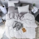 INS đơn giản gió bốn mảnh Bắc Âu phong cách Nhật Bản bộ đồ giường sọc chăn bao gồm ký túc xá ba mảnh