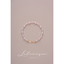 The Moon is a sea mirror light with a nuclear Aurora freshwater pearl bracelet gradient Pearl hand string