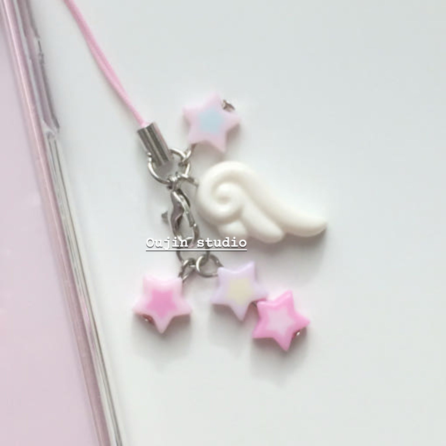 Korean-style, minimalist, sophisticated, sweet, and girly pink star angel wings pendant phone strap.