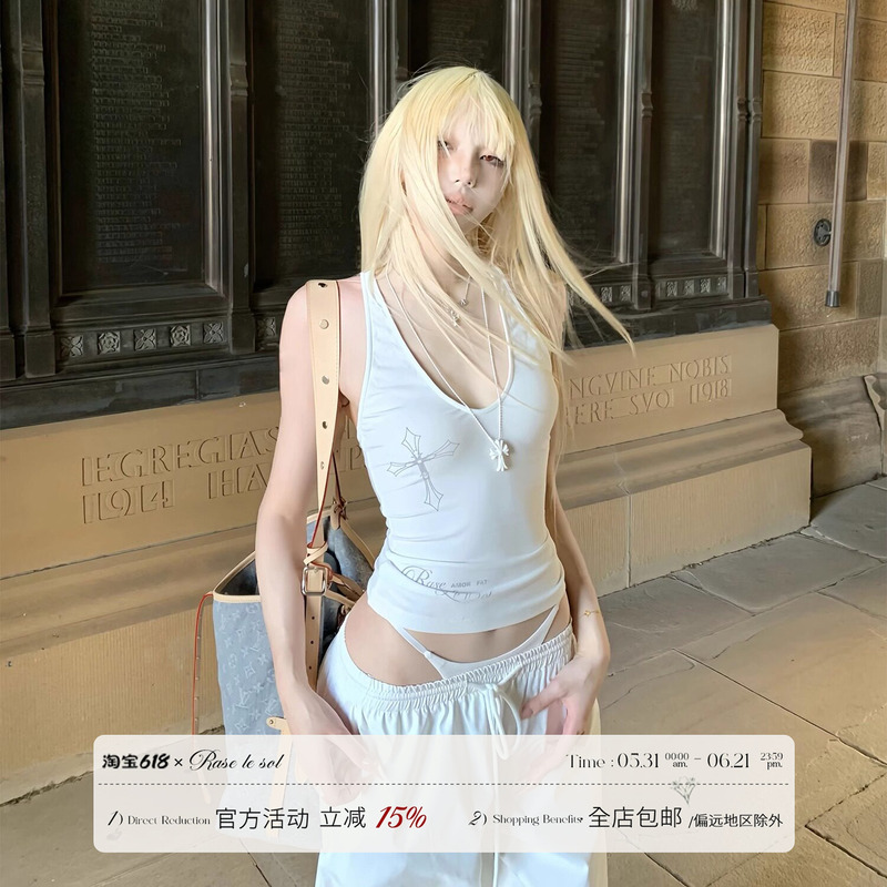 Rase Le Sol'Reverse Cross' Twist-Back Racerback Tank Top Worn as an Outer Layer with a White Camisole Top Rase Le Sol'Reverse Cross' Twist-Back Racerback Tank Top Worn as an Outer Layer with a White Camisole Top