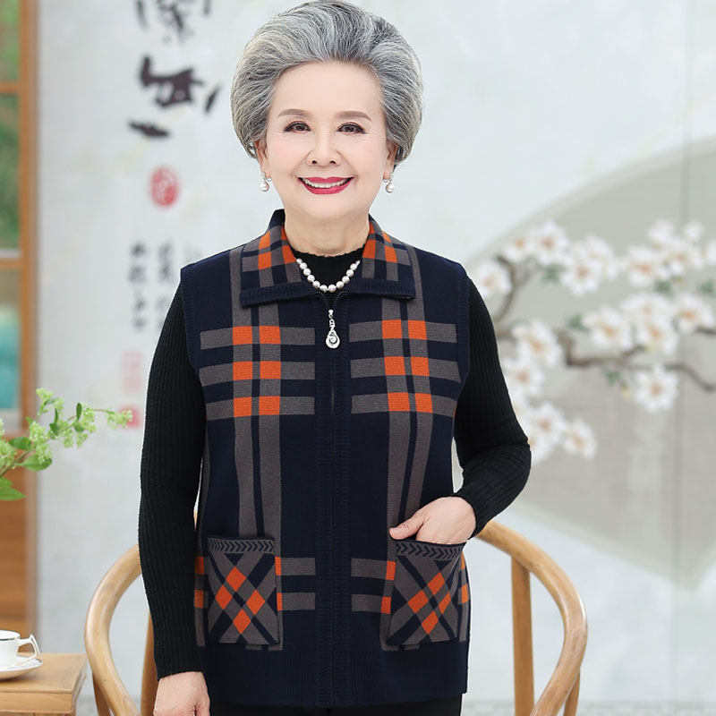 Grandma dressed in autumn vest vest 60 in 70 middle aged woman mother clamped open shirt old man clothes