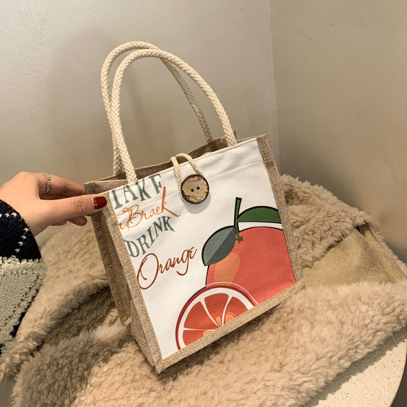 Cute hand-carried bento bag female 2021 new trendy Korean version ins net red girl student single shoulder canvas bag female