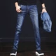 Mùa xuân 2019 mới quần jeans co giãn nam thanh niên quần lọt khe dài quần dài phiên bản Hàn Quốc của quần áo nam triều - Quần jean