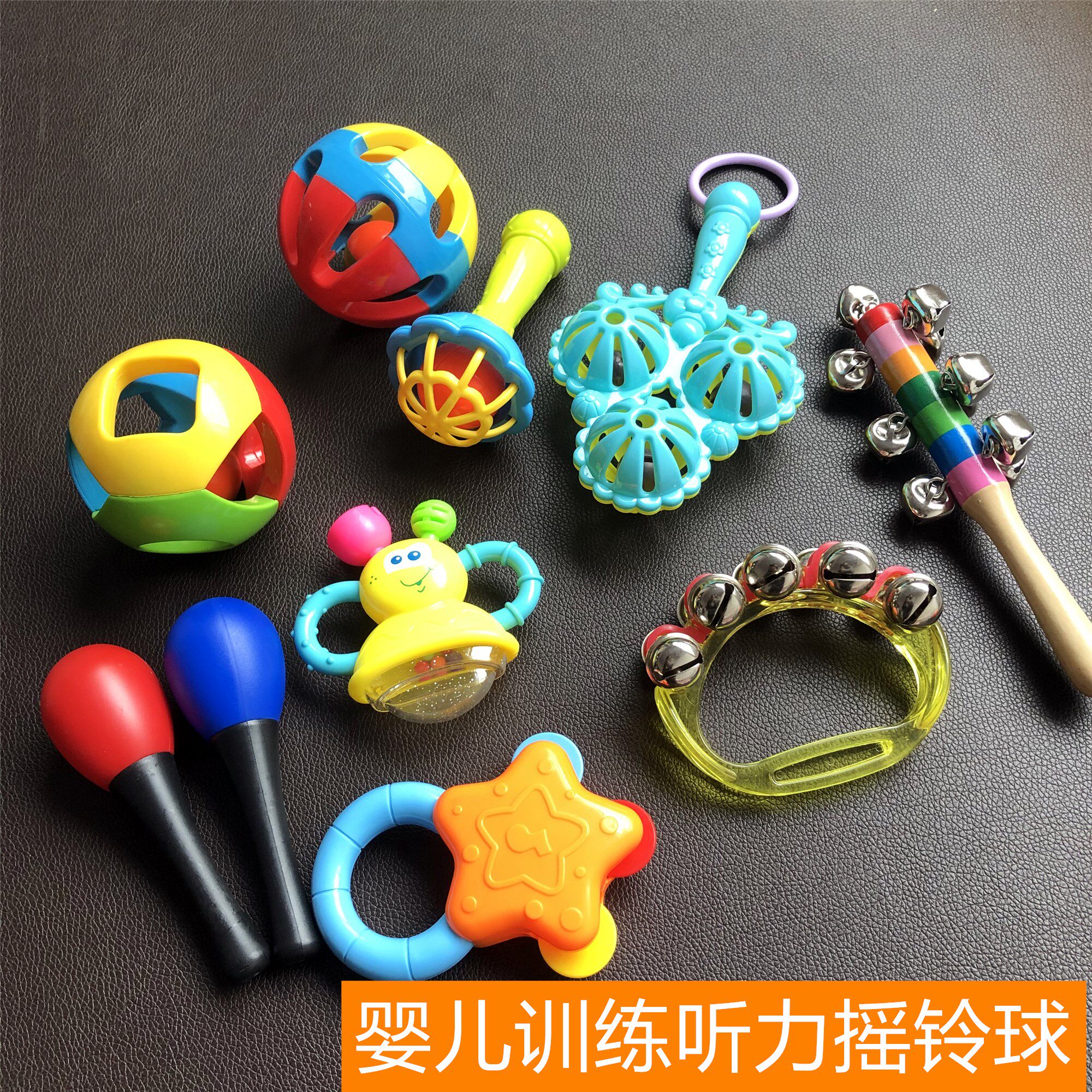 Baby hand rocking bell dance bell percussion instrument freshly nibbling puzzle small sand hammer red gripping training hearing