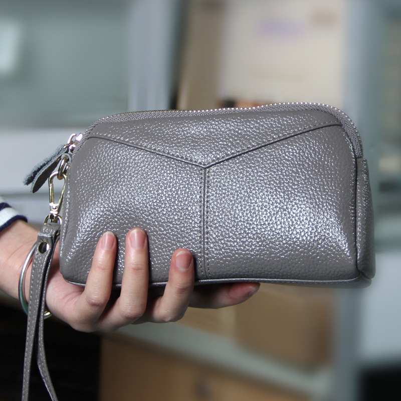 Fashion cowhide women's clutch bag women's bag Korean version soft leather lady's change hand bag zipper bag small bag mobile phone bag