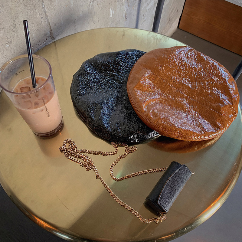 COCO LIMITED winter day wearing a hitch-aid creamy lacquer style imported parchment berets