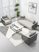 Office sofa minimalist office guests in talks for leisure area Business hospitality tea table composition suit