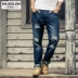 Quần Siren Châu Âu của Anh và Quần dài Hoa Kỳ Quần denim Đường dài Giới trẻ Nam Xu hướng cào quần mèo shop quần jean nam Cao bồi