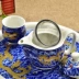 Ưu đãi đặc biệt Jingdezhen ấm trà sứ màu xanh và trắng Bộ đầy đủ của đá trà nứt khay trà đôi tách trà - Trà sứ