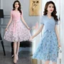Sâu 2018 xuân hè mới size lớn hè dài váy ngắn tay áo in họa tiết voan nữ 1823 váy dài xếp ly