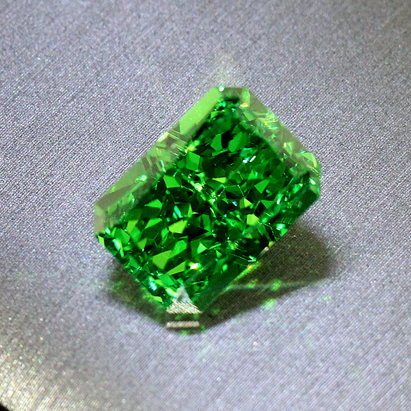 Ice cut tsavorite loose stone rectangular radiant emerald
