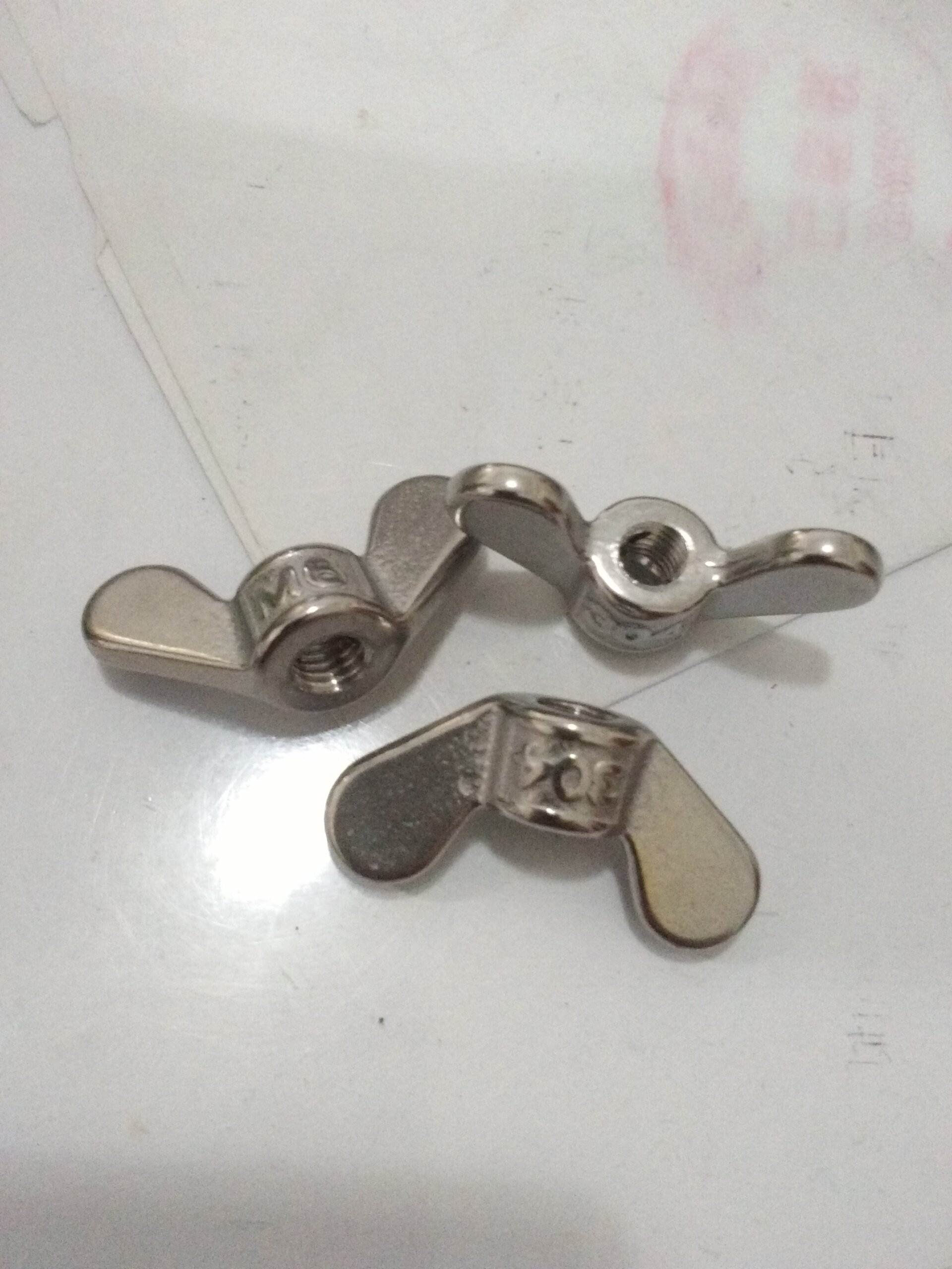 304 stainless steel pouring butterfly nut hand screwed butterfly shaped sheep angle nut Yuanbao screw cap M4 5 6 8 ---- 20