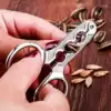 Peel melon seeds artifact Open melon seeds shell peeler clip sunflower seeds pliers Lazy people eat watermelon seeds knock pine nuts shell opener