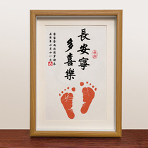 One hundred days after the full moon birthday ceremony hand and foot prints in mud to commemorate baby baby photo frame table and wall hanging