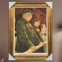 There are framed pictures of Chairman Maos portraits.