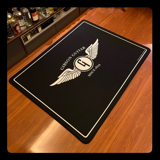 Gibson guitar logo pad rock and roll studio rehearsal room pad rock around