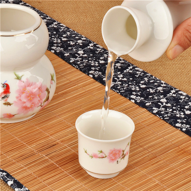 With ceramic he its drank suit warm hot very hot temperature hip flask gourd wine pot liquor wine and rice wine liquor cup small a small handleless wine cup