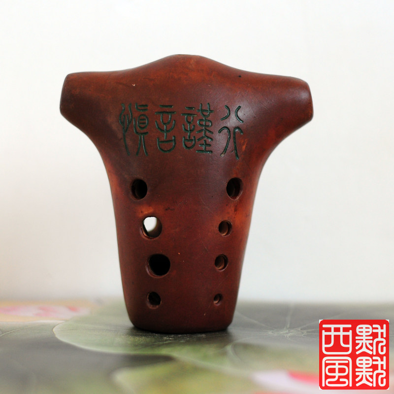 Yin's Tao Hoon advanced playing with a ten-hole bull head and a murky West Wind Music bungalow