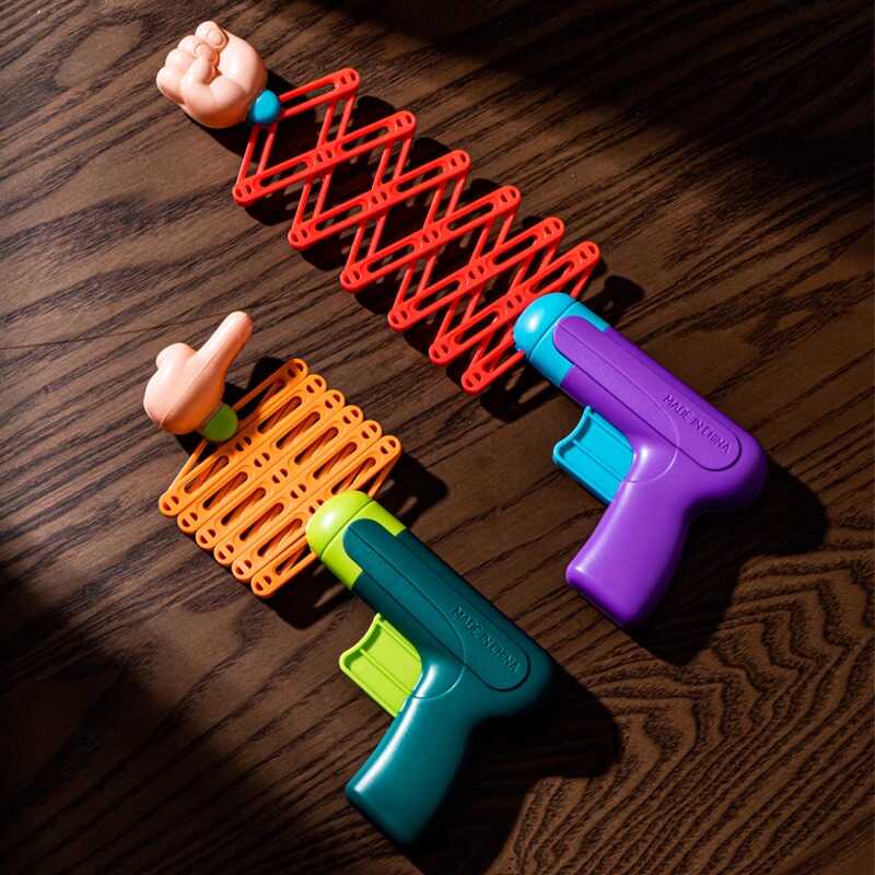 儿童伸缩拳头枪解压玩具创意整蛊搞怪