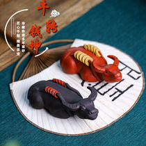 Creative Purple Sands Bull transfer money Kun tea spotting piece Yixing boutique can raise tea to play Buffalo Tea Road accessories Bull Turns Dry Kun