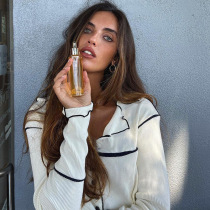 2021 Winter v-neck long sleeve single-breasted wooden ear slim solid color commuter temperament knitted cardigan